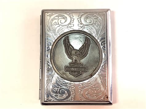 nulite silver metal holyhawk cycles emblem tobacco box roller machine|Does anyone have a vintage nulite American legend cigarette .